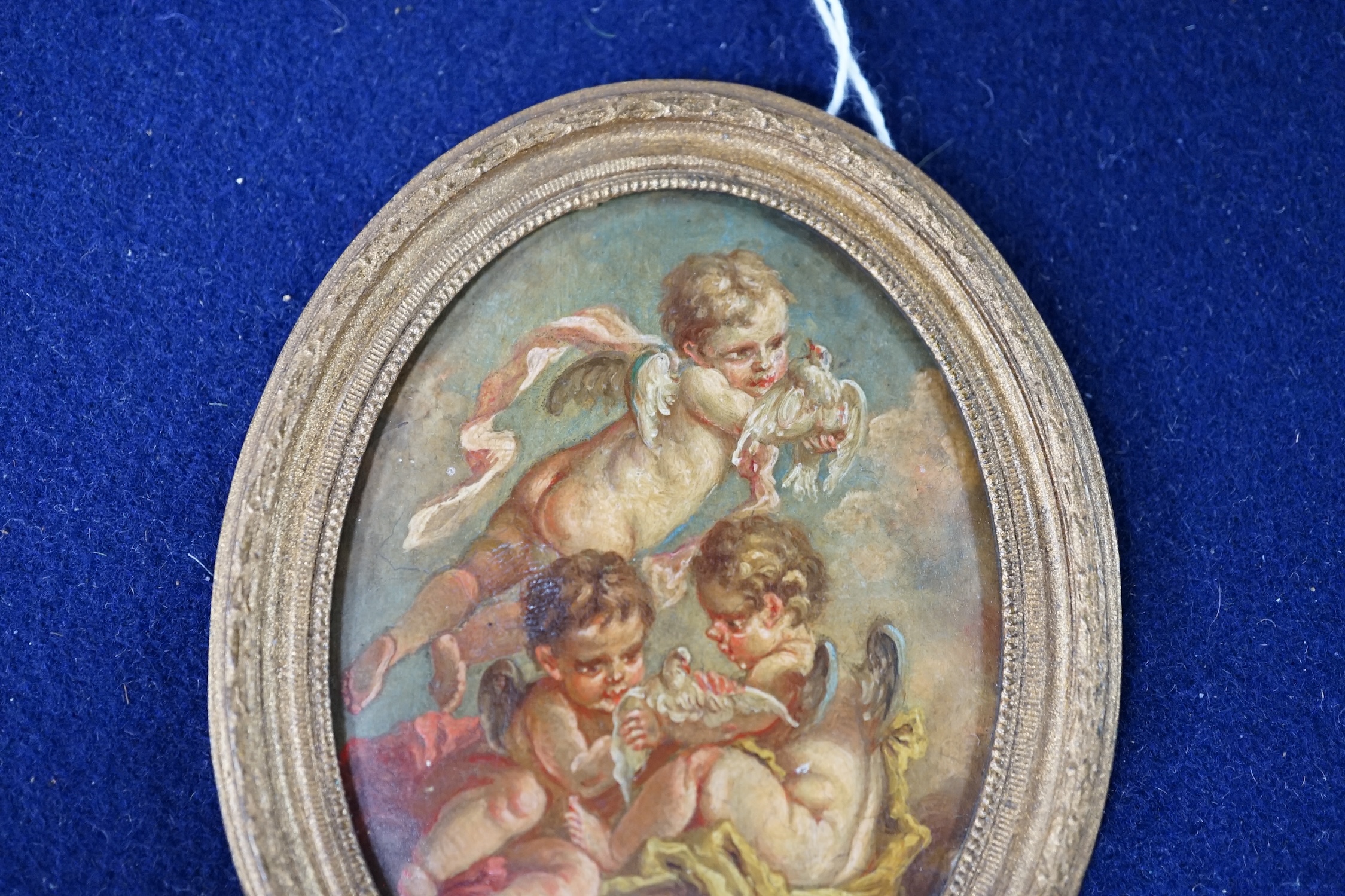 18th/19th century school, miniature oval oil on copper of Amorini, gilt framed, 7.5 x 5.5cm. Condition - fair to good